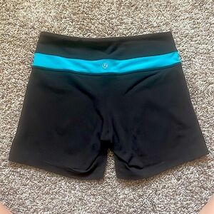 Lululemon blue and black mid rise spandex shorts